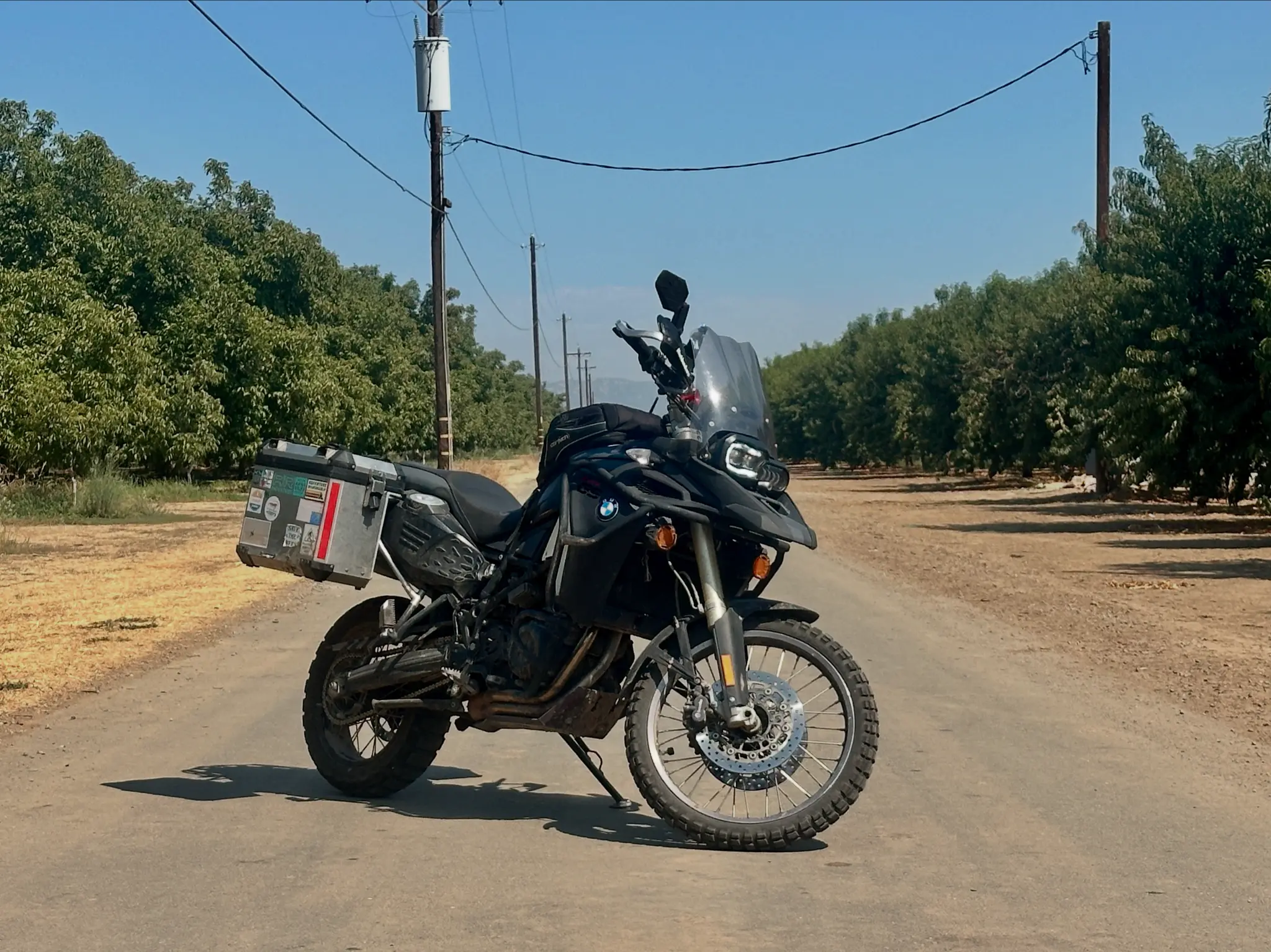 BMW F800ADV motorcycle with dashcam, TPMS, and phone charger installed
